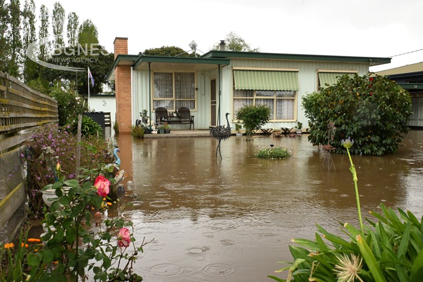 Catastrophic floods trap dozens of people in Australia