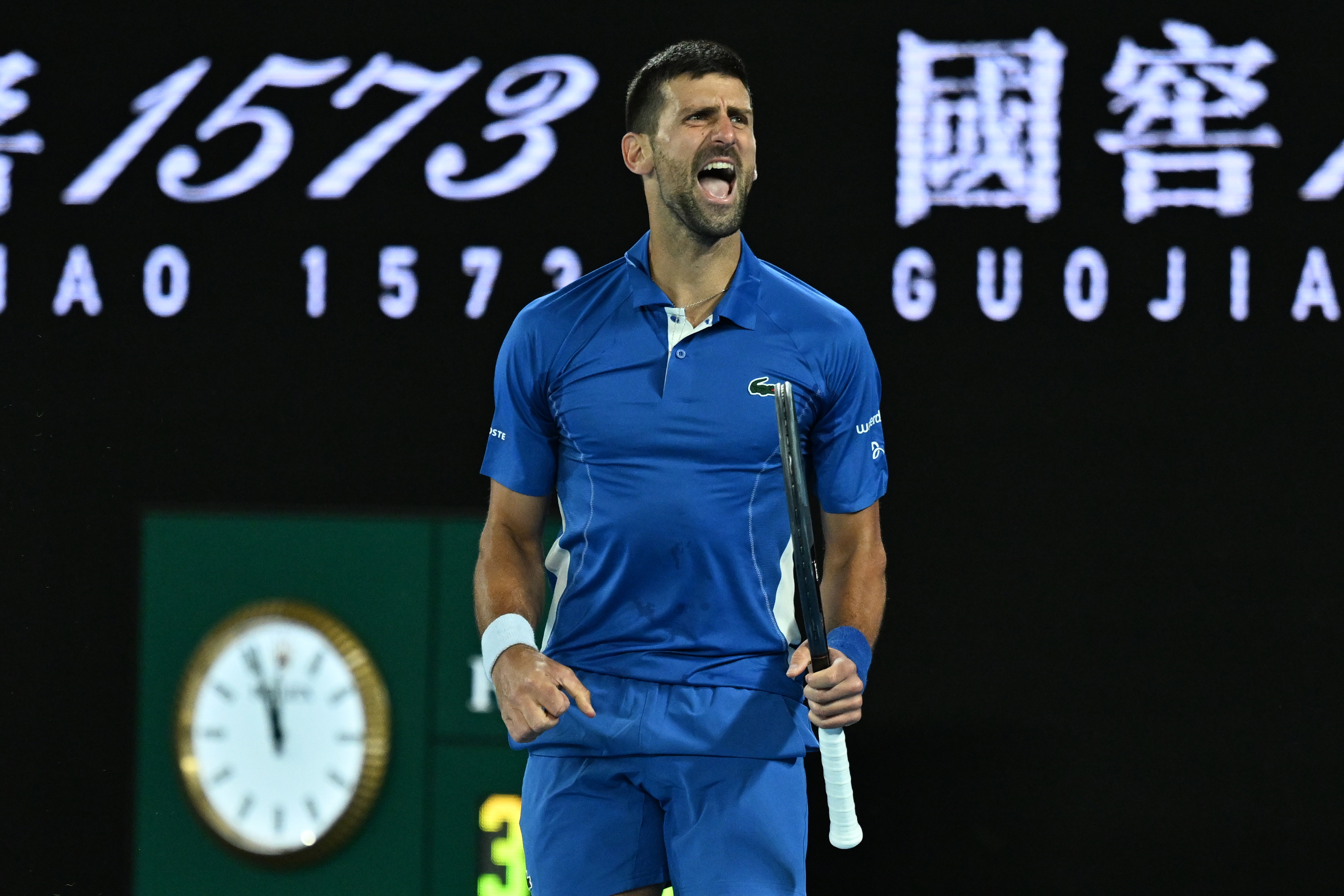 Djokovic digs deep against Popyrin to continue title defence
