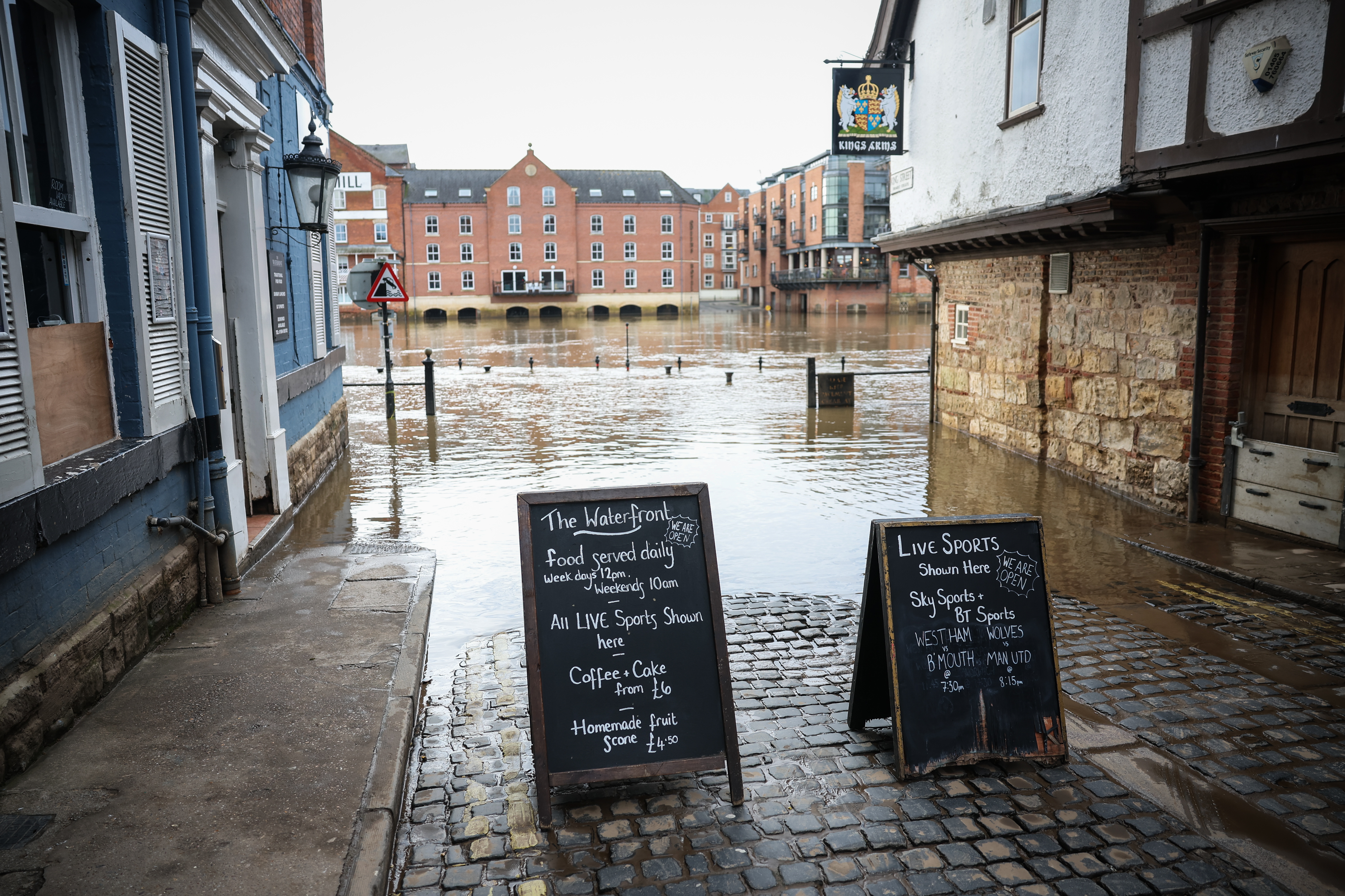 In Britain, a storm has canceled flights, trains and ferry services