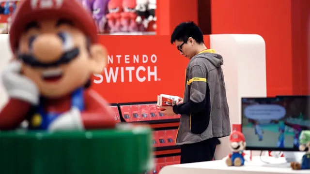 Nintendo unveils new version of best-selling Switch console