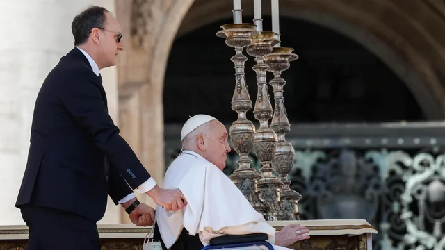 Pope makes surprise appearance with crowd in Vatican square