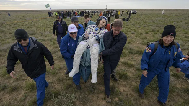 NASA's oldest active astronaut returns to Earth on his 70th birthday
