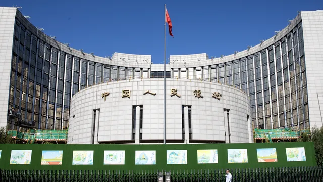 China's central bank cuts two key interest rates to historic lows
