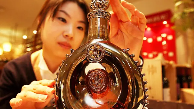 Cognac producer Remy Cointreau lowers profit target due to US and Chinese tariffs