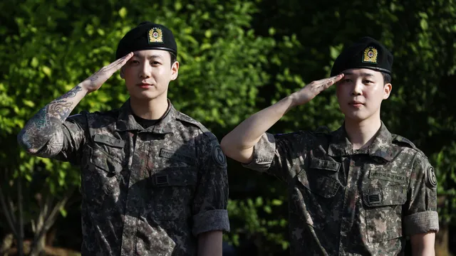 Two more BTS megastars return from military service in South Korea