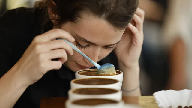 Why do we get headaches when we stop drinking coffee?